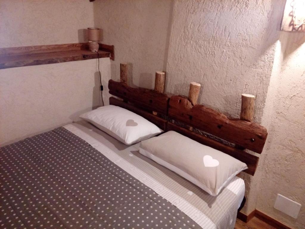 Postel nebo postele na pokoji v ubytování Agri-b&b Lou Col