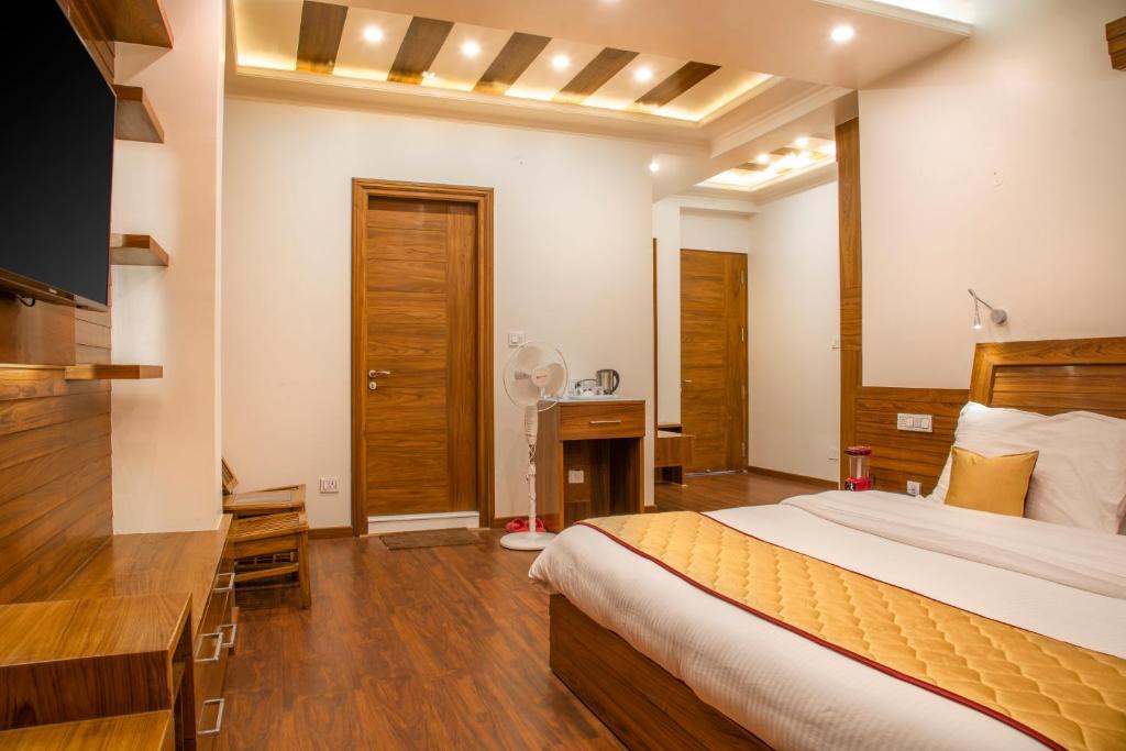 Postel nebo postele na pokoji v ubytování The White Haven Homestay (Shimla)