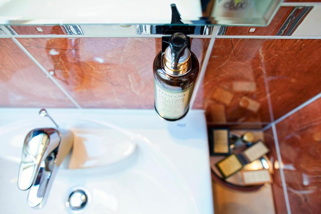 Koupelna v ubytování Hotel Abácie & Wellness