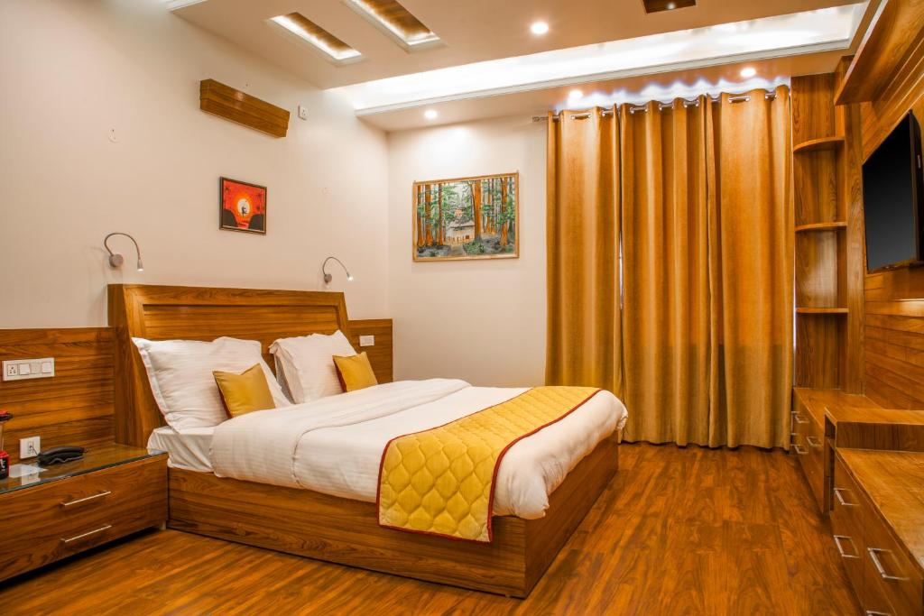 Postel nebo postele na pokoji v ubytování The White Haven Homestay (Shimla)