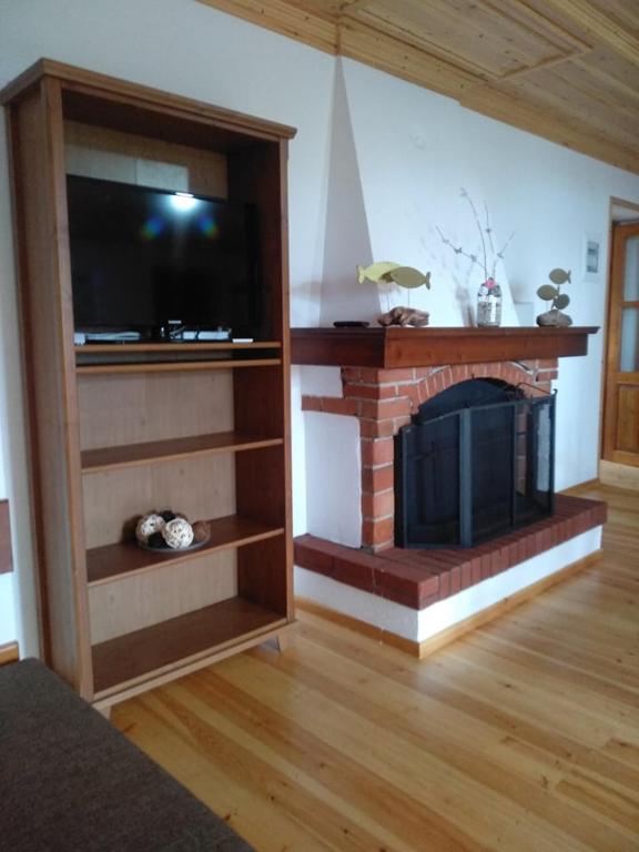 TV a/nebo společenská místnost v ubytování Kastro View