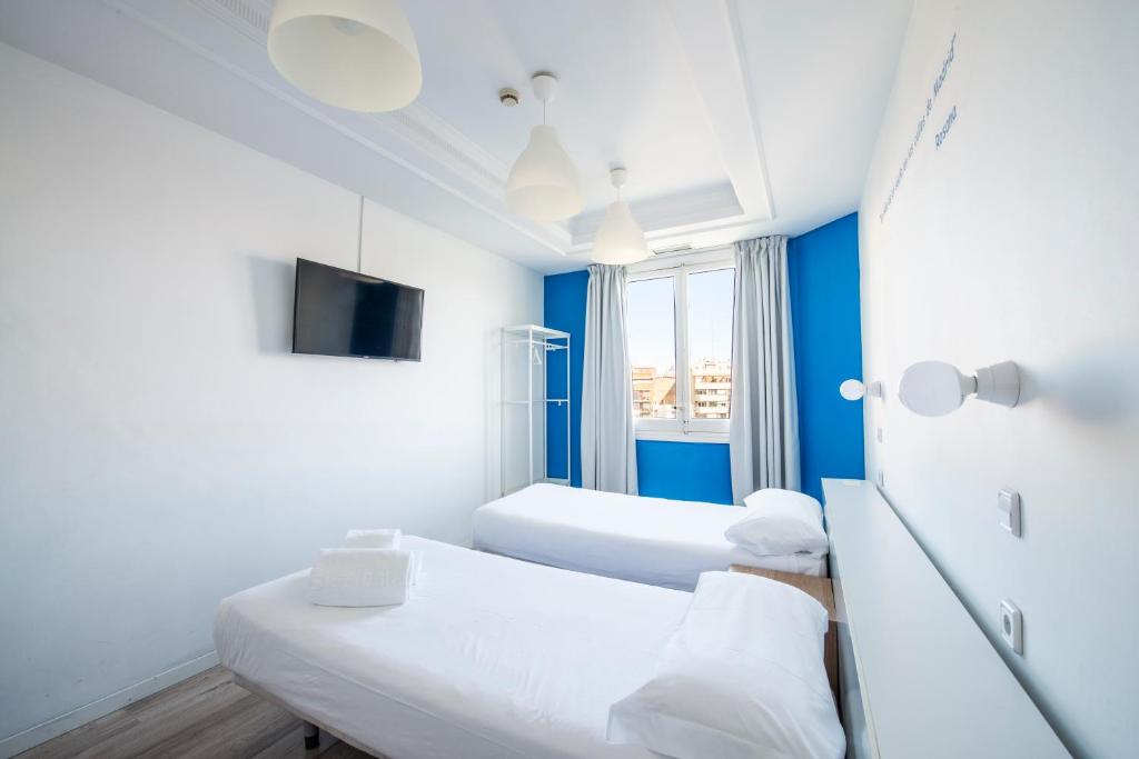 Safestay Madrid Central - Quarto Dormitório Misto Com 8 Camas E Casa De Banho Partilhada