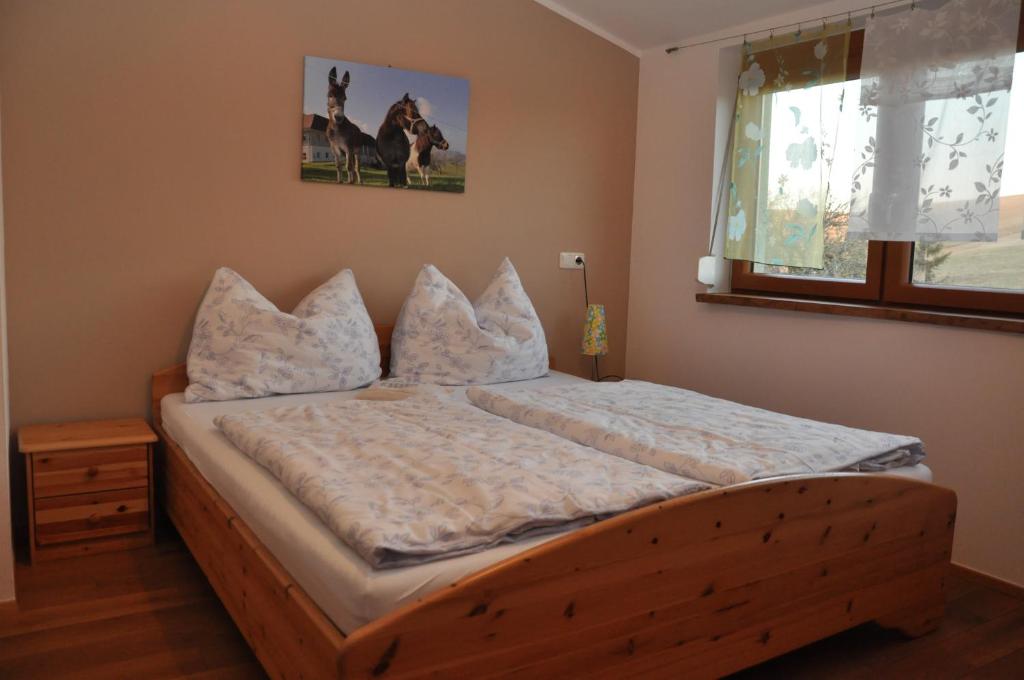 Postel nebo postele na pokoji v ubytování Haaghof Ertl