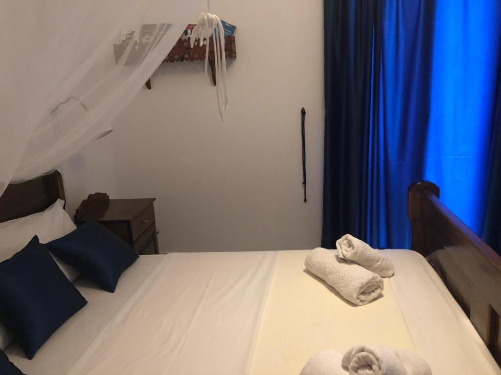 Postel nebo postele na pokoji v ubytování Maistrali