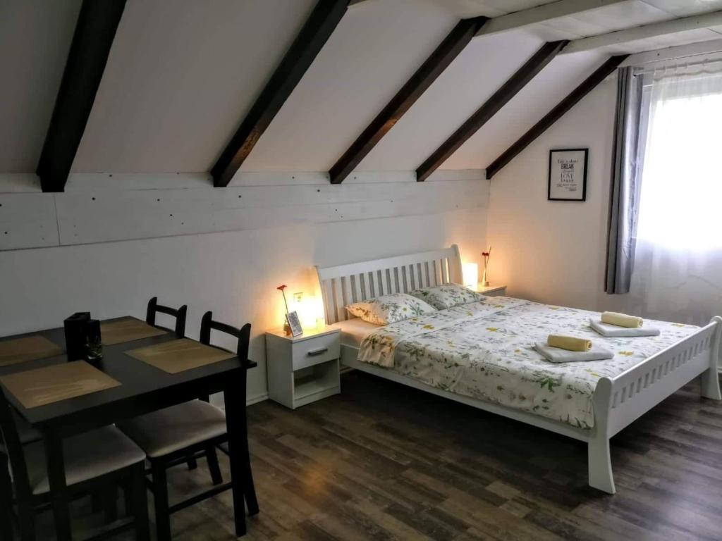 Cama o camas de una habitación en House Mesić
