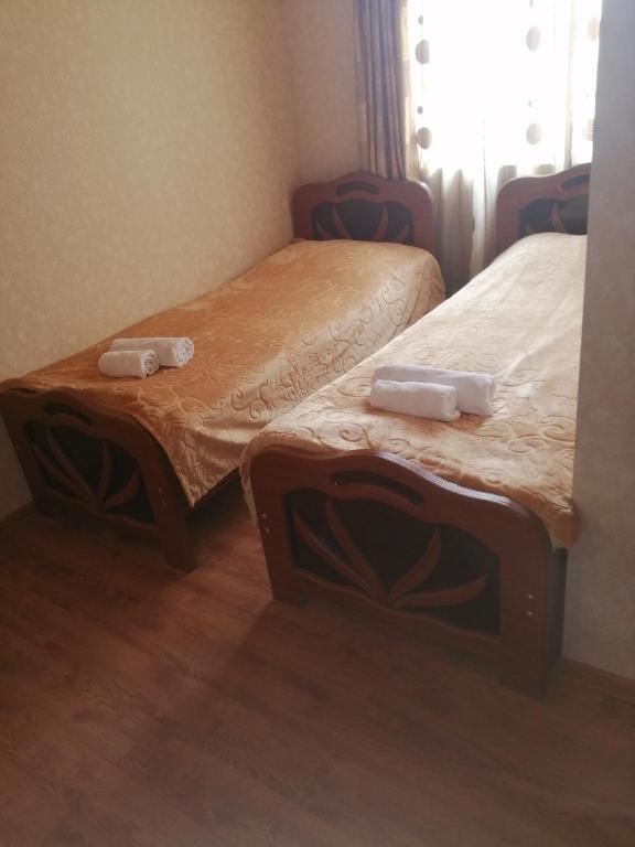 Postel nebo postele na pokoji v ubytování Jeiran Japaridze's Guesthouse