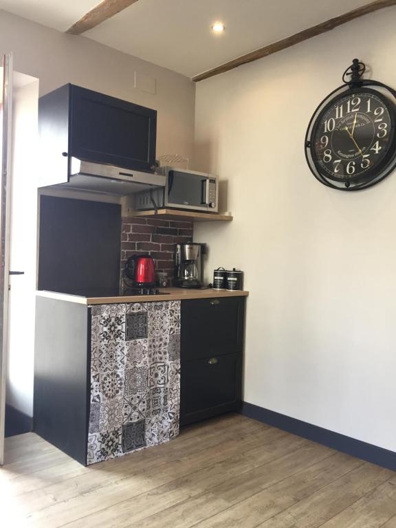 Kuchyň nebo kuchyňský kout v ubytování Gite L'Atelier