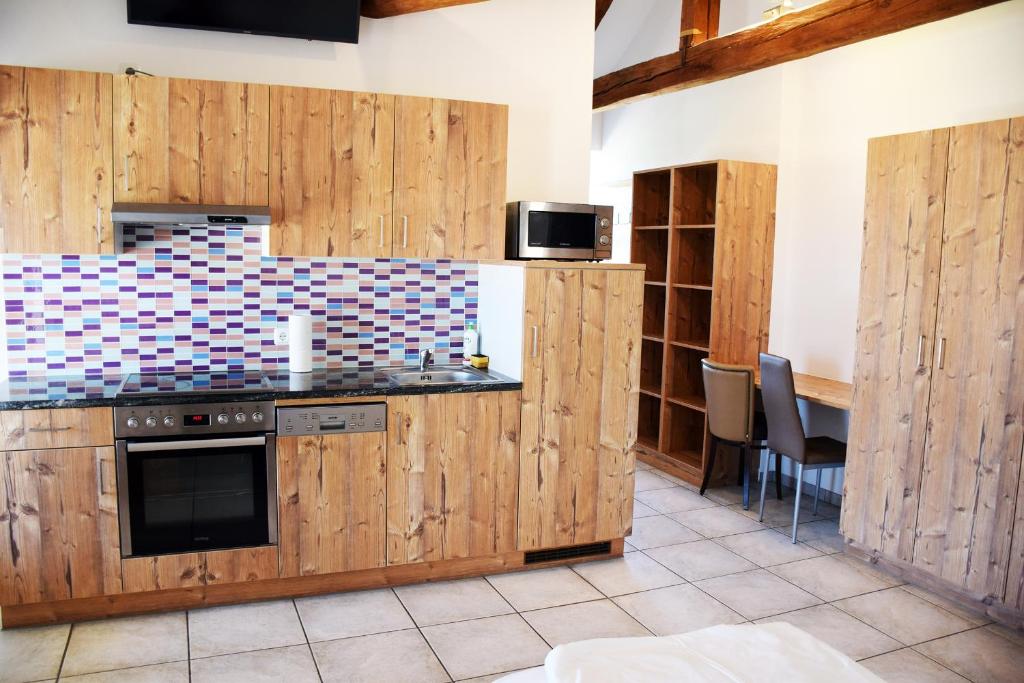 Kuchyň nebo kuchyňský kout v ubytování Apartment´s Marchtrenk
