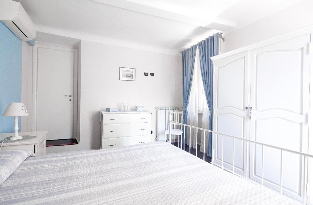 Łóżko lub łóżka w pokoju w obiekcie Casa Del Cavaliere