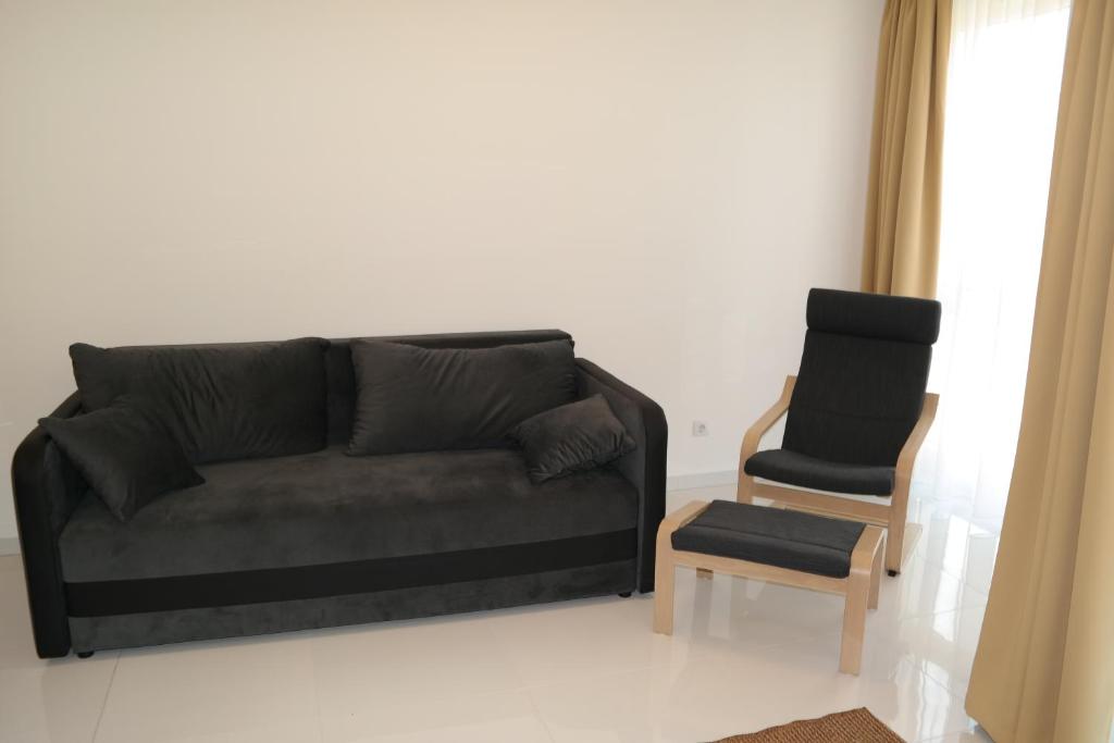 Posezení v ubytování Holiday Apartman with Free Parking