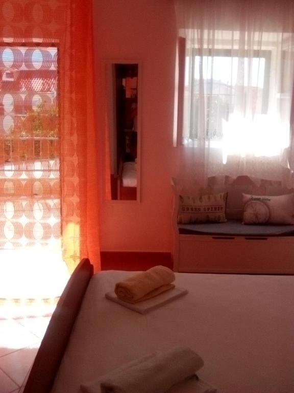 Postel nebo postele na pokoji v ubytování Apartments Mesec
