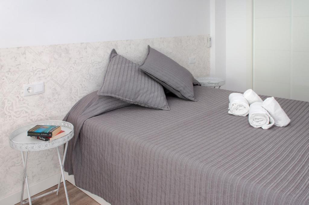 Posteľ alebo postele v izbe v ubytovaní Myflats Arquitecto