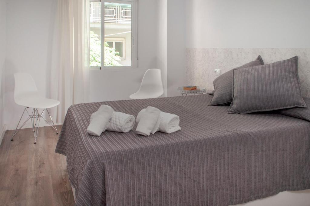 Posteľ alebo postele v izbe v ubytovaní Myflats Arquitecto