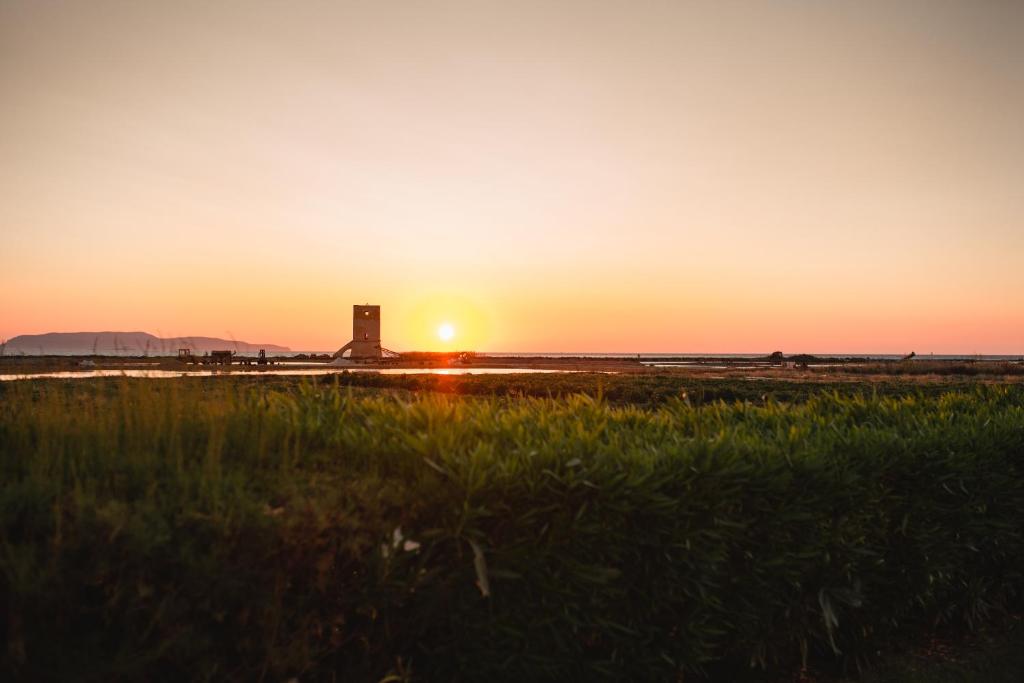 The sunrise or sunset as seen from a szállodákat or nearby