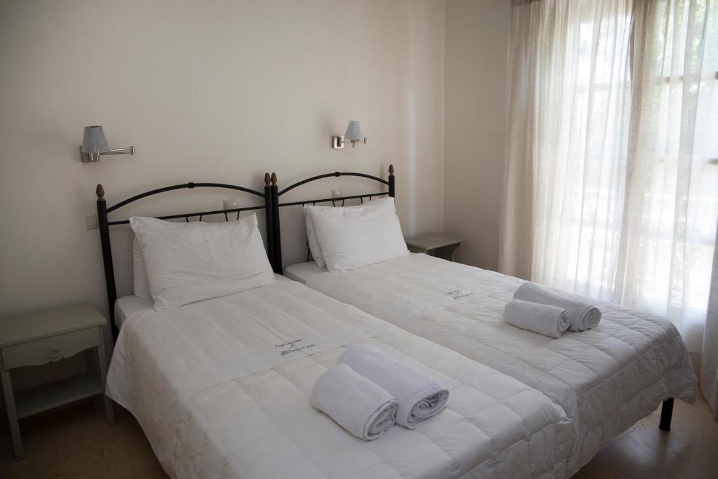 Postel nebo postele na pokoji v ubytování Mimoza