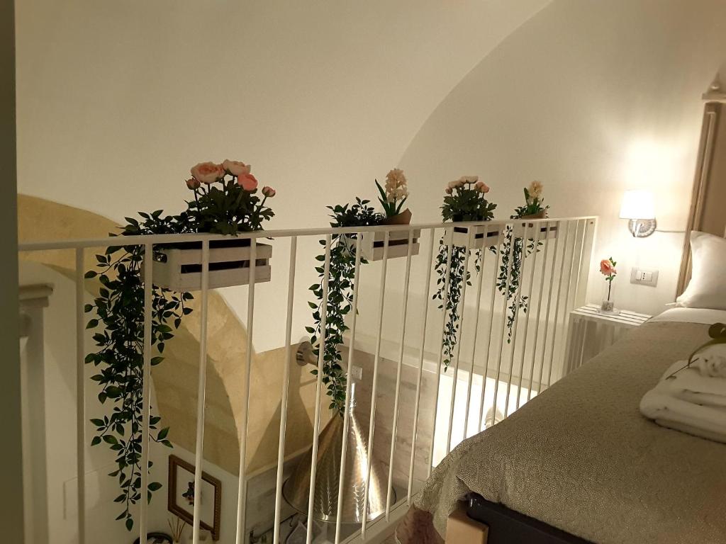 Postel nebo postele na pokoji v ubytování SASSO BIANCO