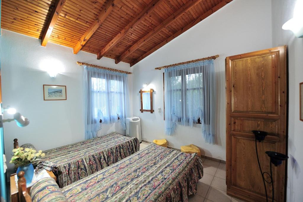 Postel nebo postele na pokoji v ubytování Anastazia Paradise
