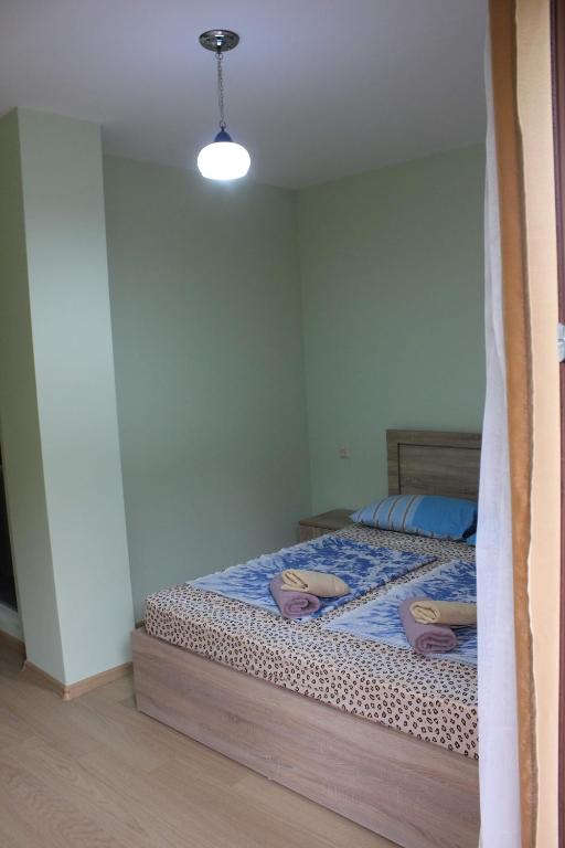 Postel nebo postele na pokoji v ubytování Guesthouse Maria