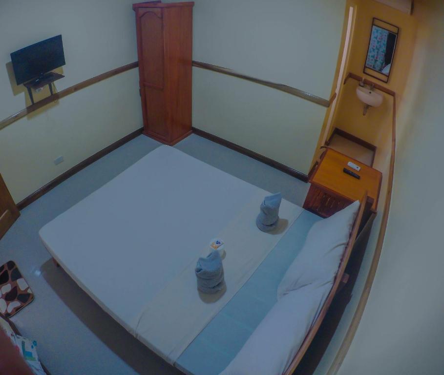 Postel nebo postele na pokoji v ubytování Ocean Manor Inn