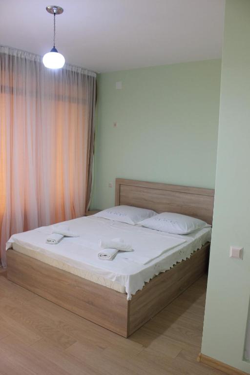 Postel nebo postele na pokoji v ubytování Guesthouse Maria