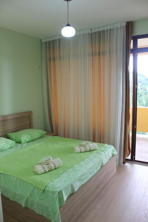 Postel nebo postele na pokoji v ubytování Guesthouse Maria