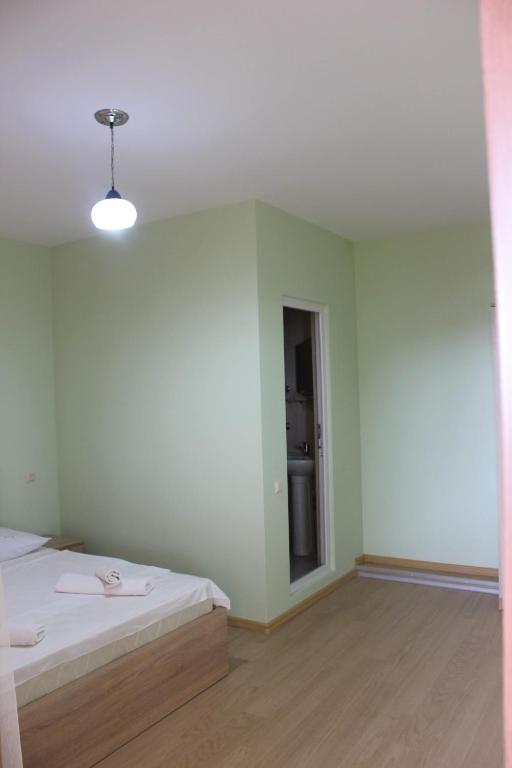 Postel nebo postele na pokoji v ubytování Guesthouse Maria