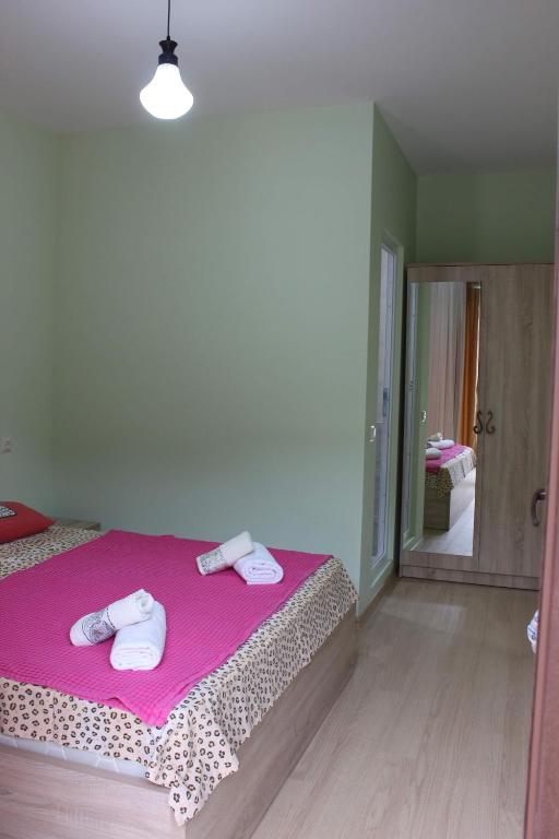 Postel nebo postele na pokoji v ubytování Guesthouse Maria