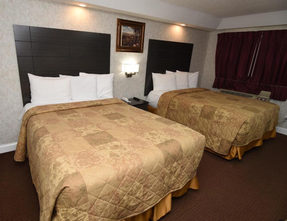 Postel nebo postele na pokoji v ubytování Country View Inn & Suites Atlantic City