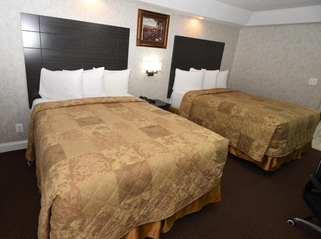 Postel nebo postele na pokoji v ubytování Country View Inn & Suites Atlantic City