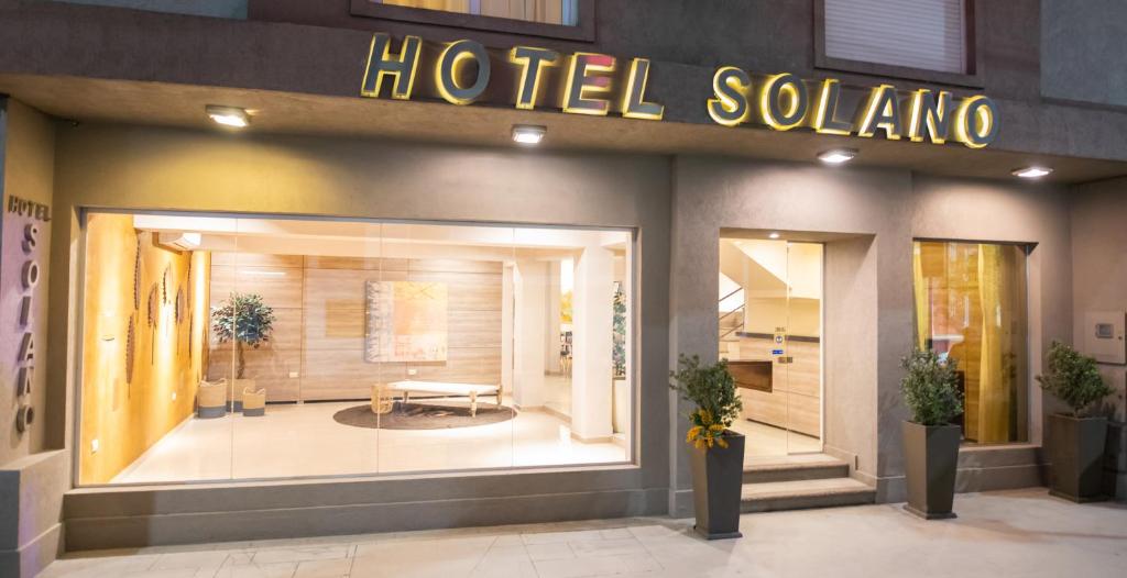 a store front of a hotel salon with a sign on it at Hotel Solano in Santiago del Estero