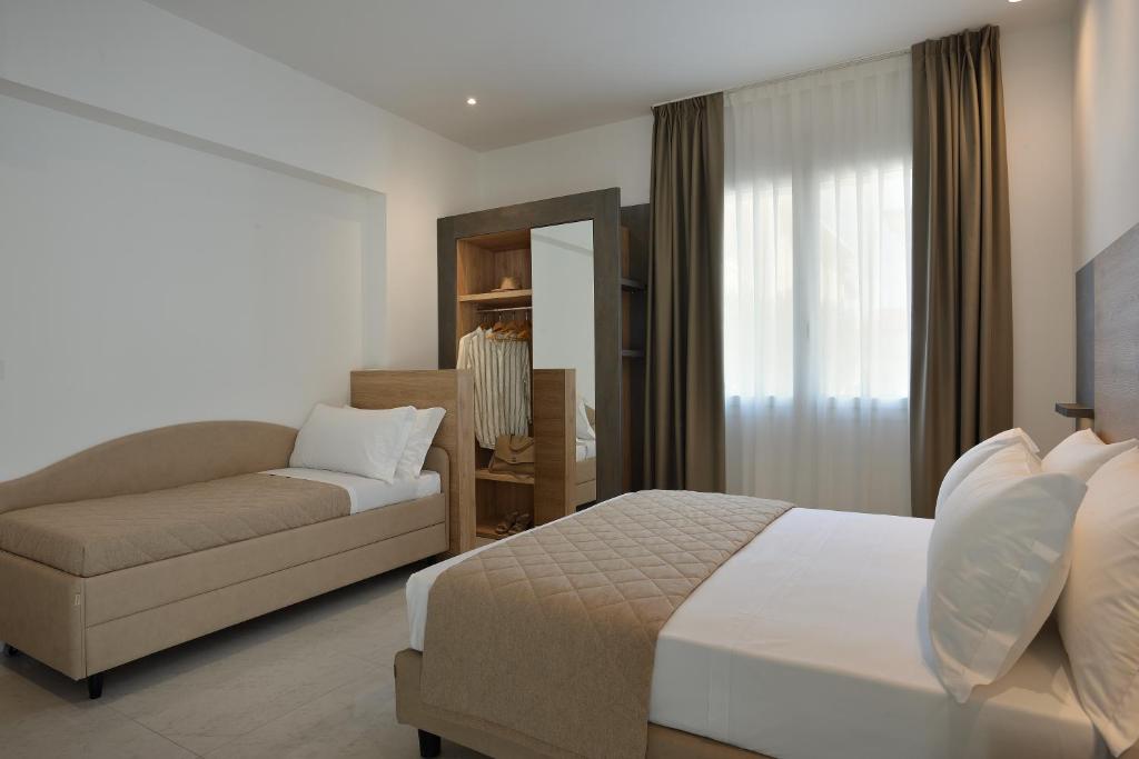Postel nebo postele na pokoji v ubytování Hotel Ducale
