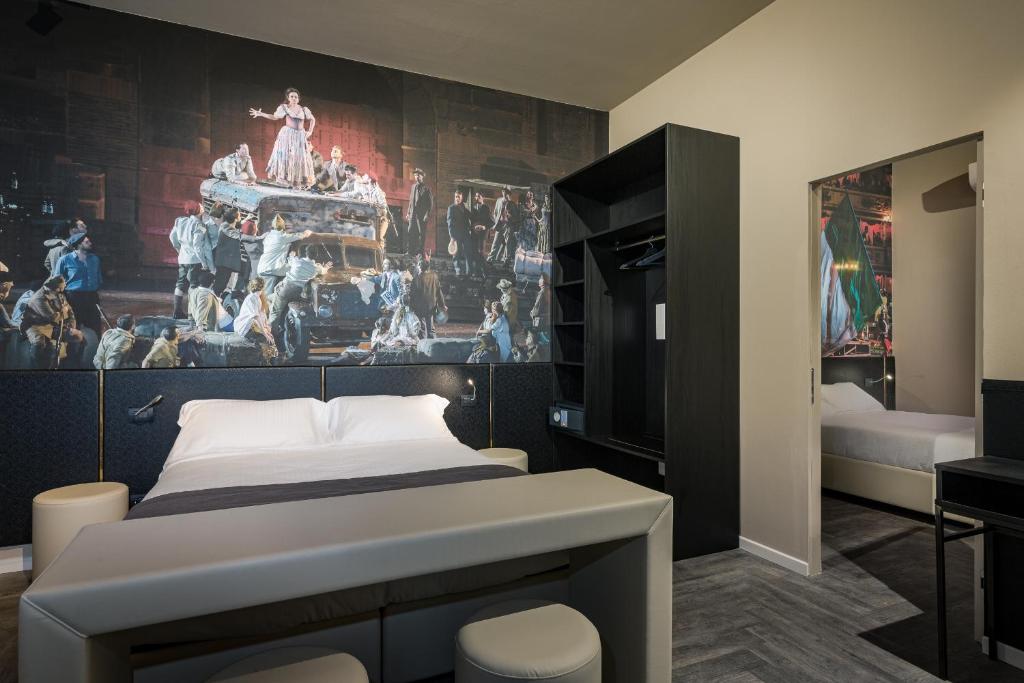 Postel nebo postele na pokoji v ubytování Italianflat - Theatrum Rooms and Suite