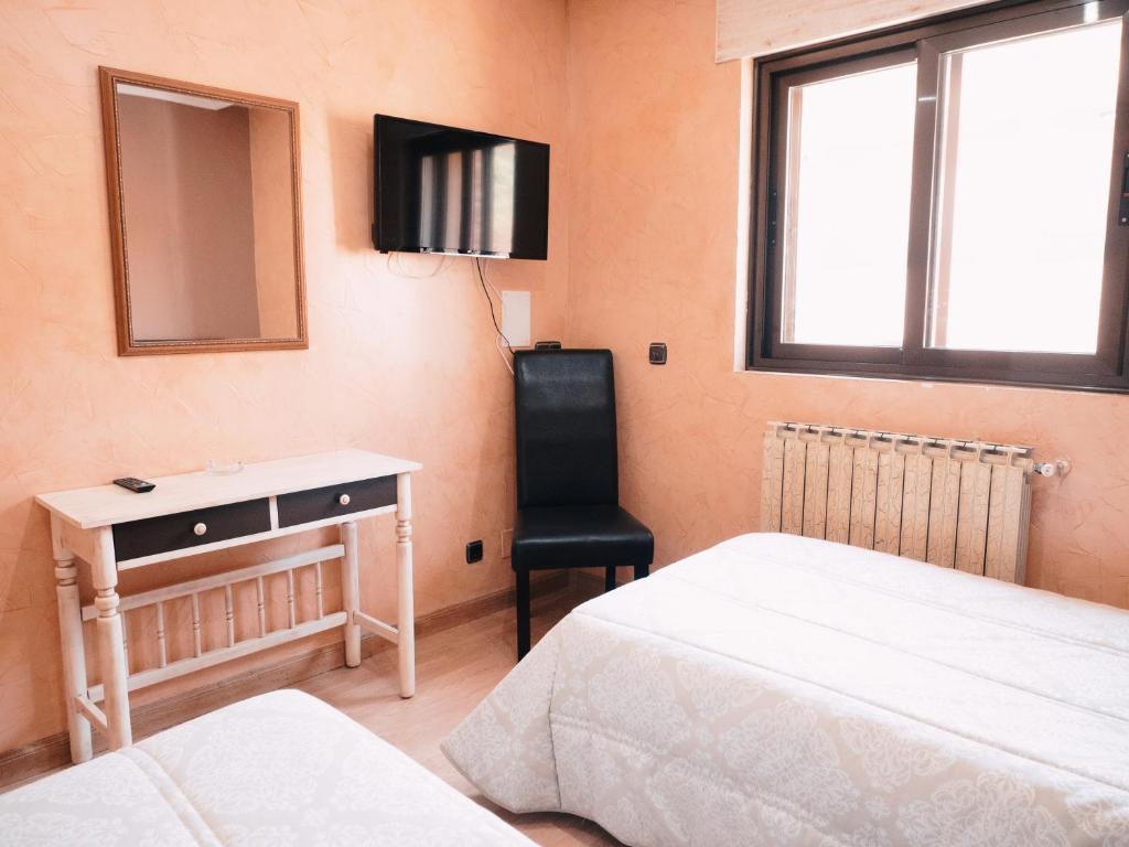 Postel nebo postele na pokoji v ubytování Hotel Los Toreros