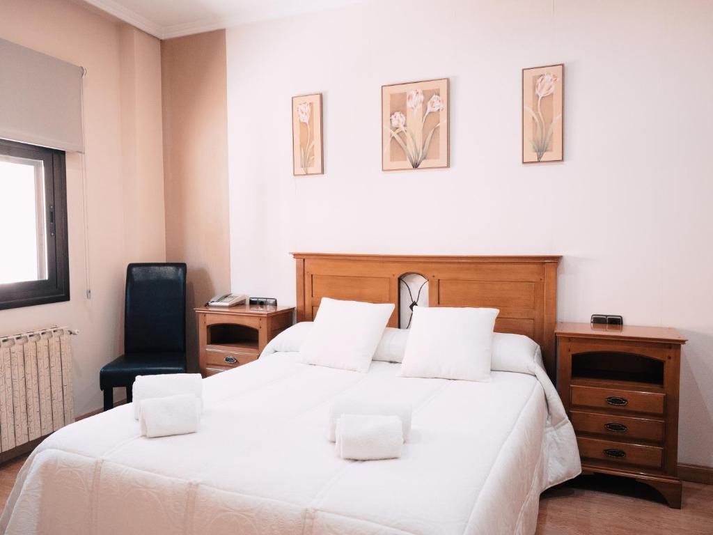 Postel nebo postele na pokoji v ubytování Hotel Los Toreros