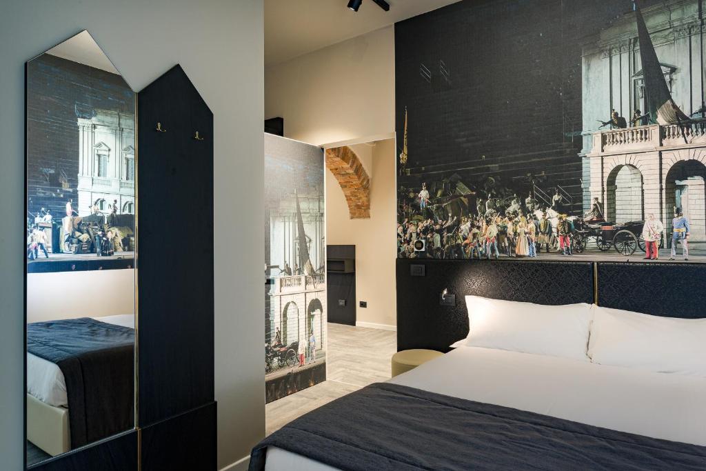 Postel nebo postele na pokoji v ubytování Italianflat - Theatrum Rooms and Suite