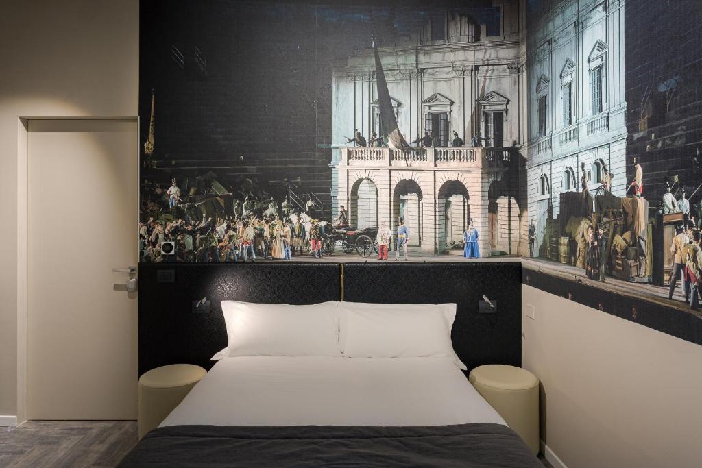 Postel nebo postele na pokoji v ubytování Italianflat - Theatrum Rooms and Suite