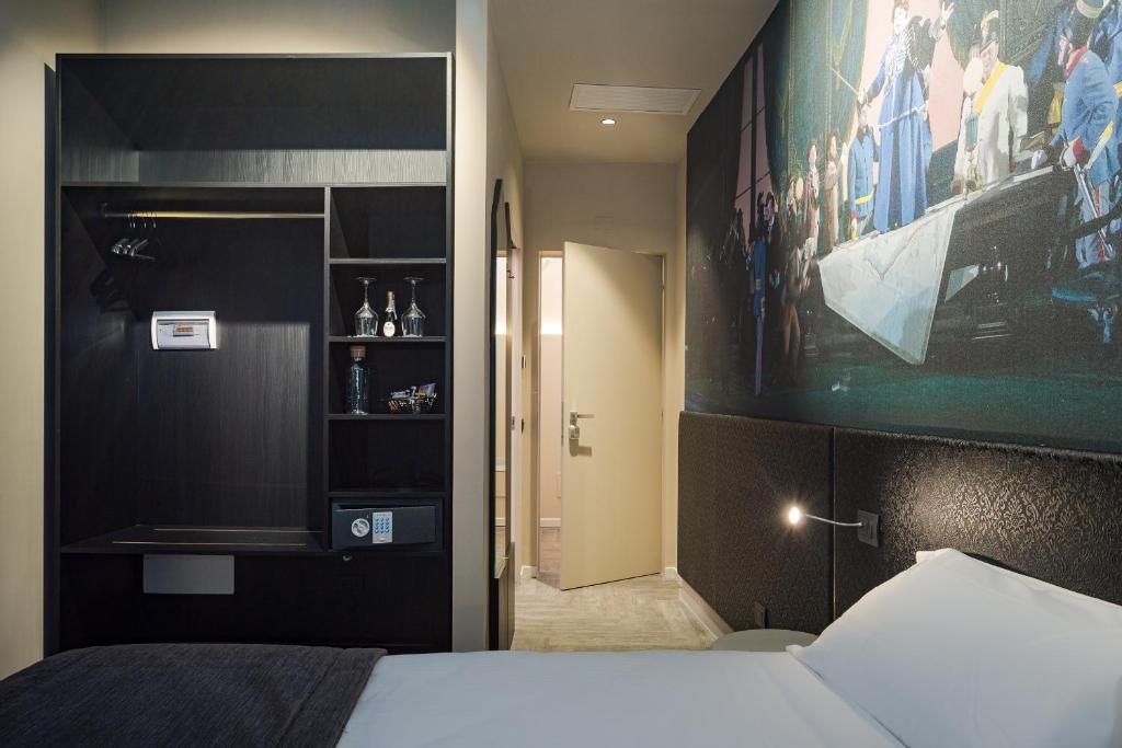 Postel nebo postele na pokoji v ubytování Italianflat - Theatrum Rooms and Suite