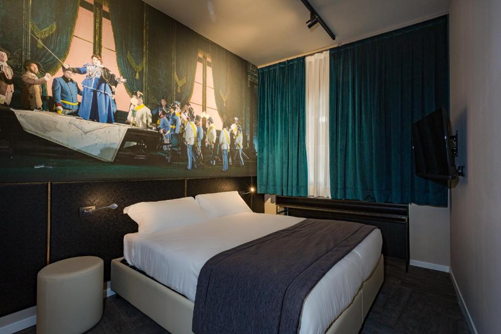 Postel nebo postele na pokoji v ubytování Italianflat - Theatrum Rooms and Suite