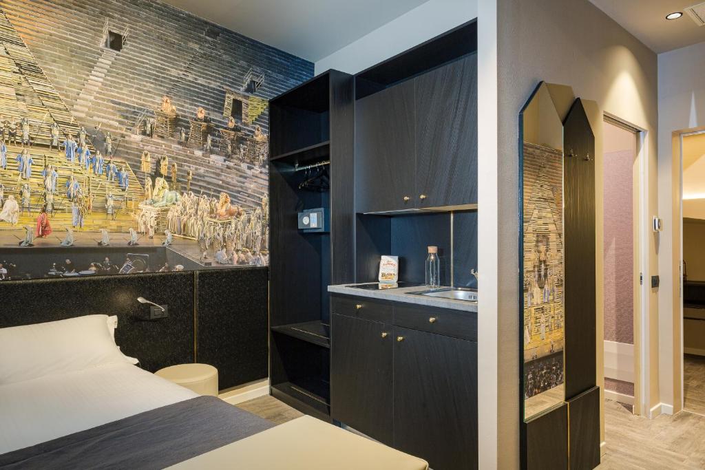 Postel nebo postele na pokoji v ubytování Italianflat - Theatrum Rooms and Suite