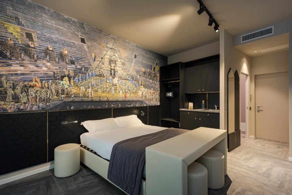 Postel nebo postele na pokoji v ubytování Italianflat - Theatrum Rooms and Suite