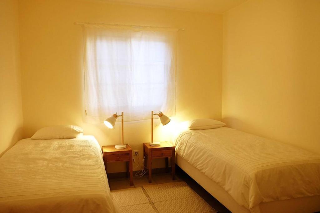 Postel nebo postele na pokoji v ubytování PERSEIDAS