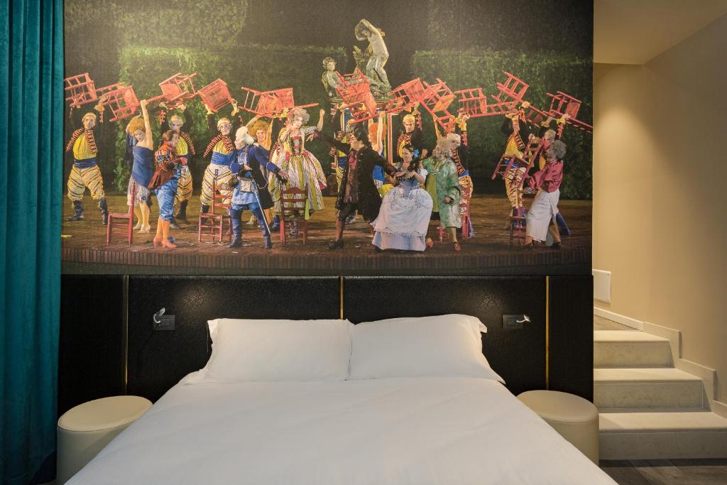 Postel nebo postele na pokoji v ubytování Italianflat - Theatrum Rooms and Suite