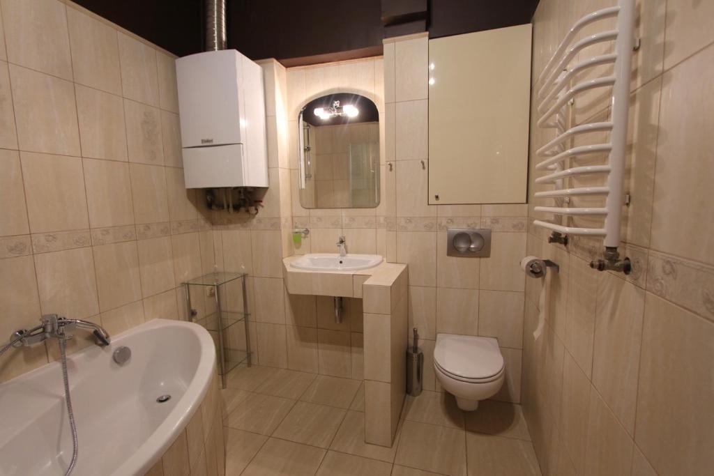 Koupelna v ubytování Chmielna 5 Rooms & Apartments