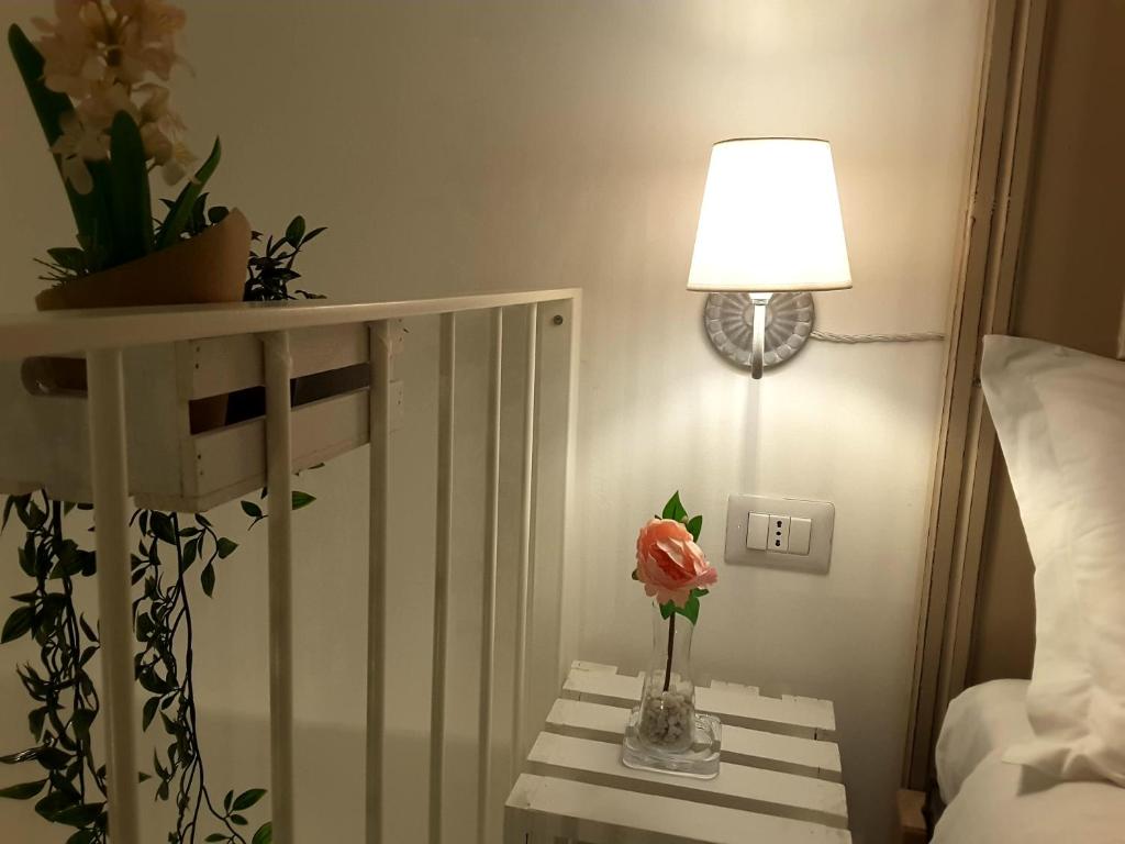 Postel nebo postele na pokoji v ubytování SASSO BIANCO
