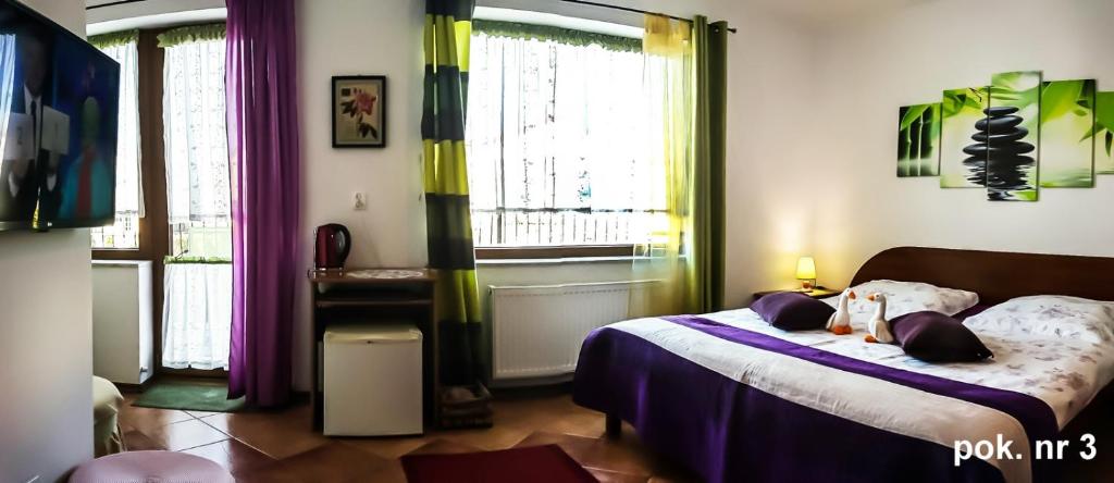 Posteľ alebo postele v izbe v ubytovaní Willa Christo dom z duszą