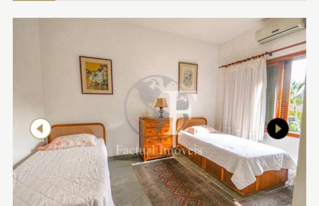  Deslumbrante casa condomínio fechado praia de Pernambuco - Guarujá