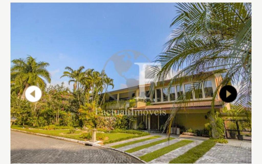  Deslumbrante casa condomínio fechado praia de Pernambuco - Guarujá