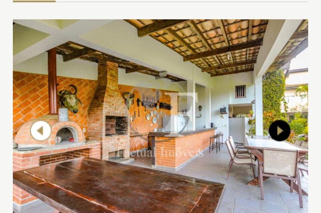  Deslumbrante casa condomínio fechado praia de Pernambuco - Guarujá