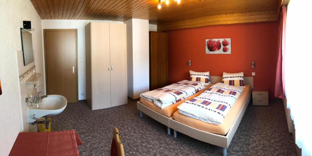 Postel nebo postele na pokoji v ubytování Ferienhaus Perle