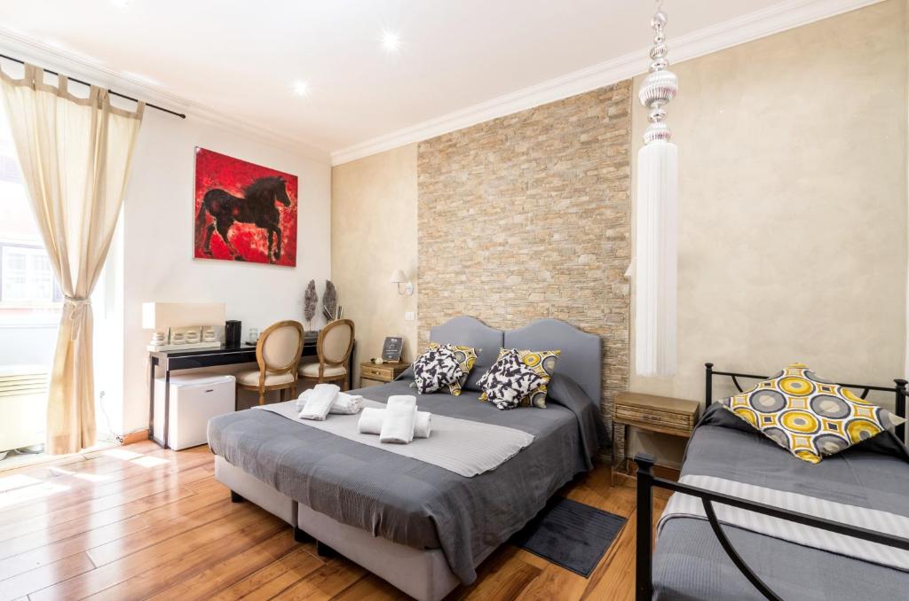 Postel nebo postele na pokoji v ubytování La dolce vita QG